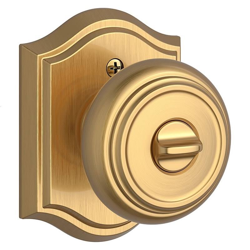 Satin Brass Keyed Entry Door Knob with Arch Rose K620